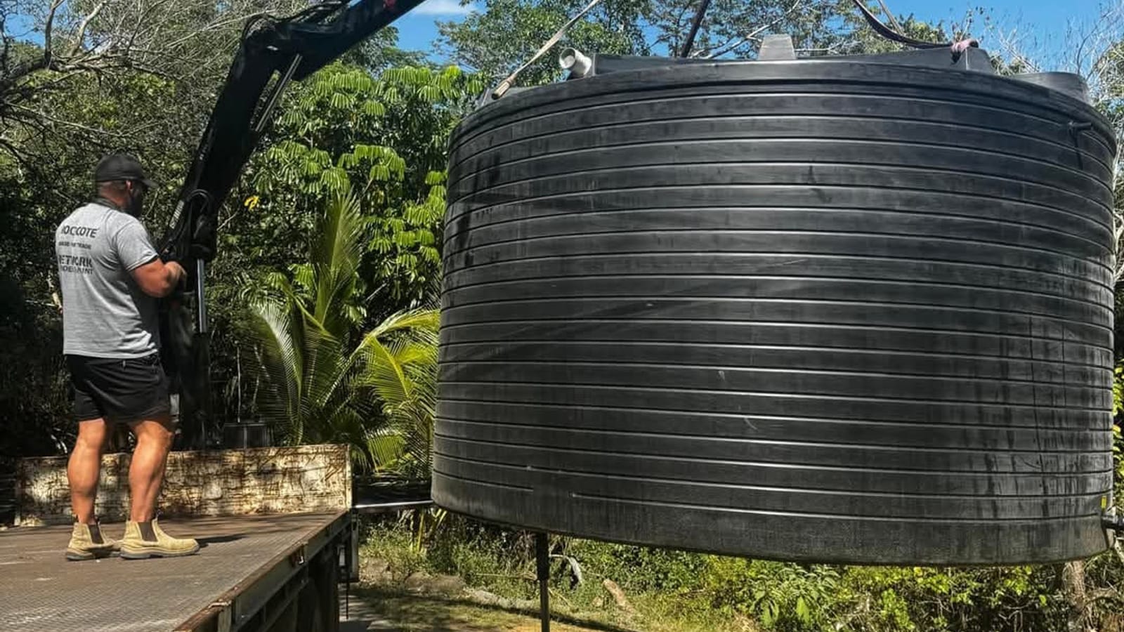 Craning a large water tank into place
